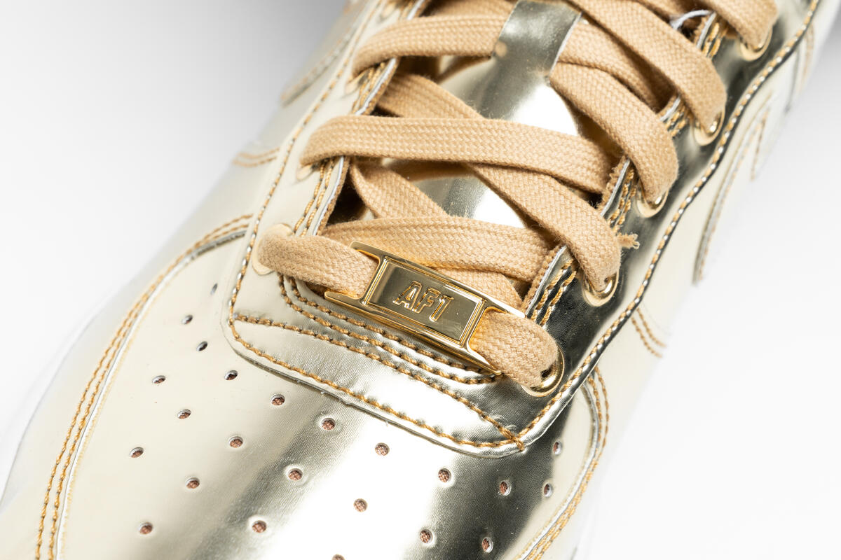 nike women's air force 1 sp metallic gold