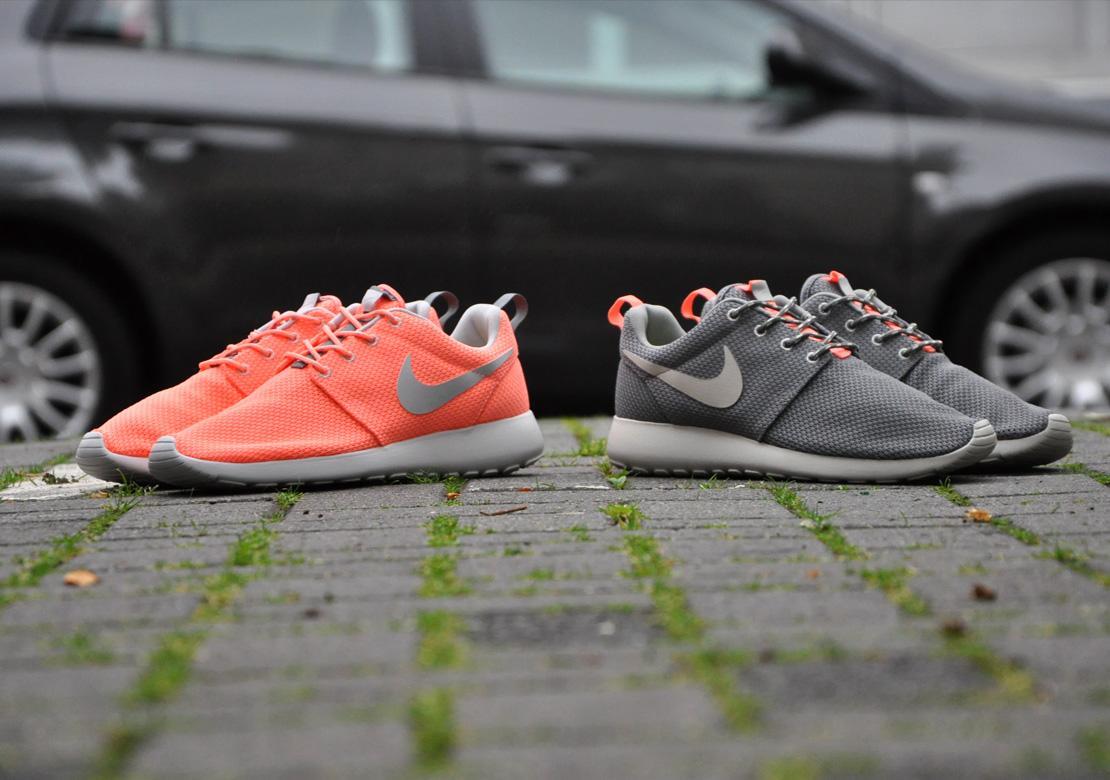 grey and pink roshe run