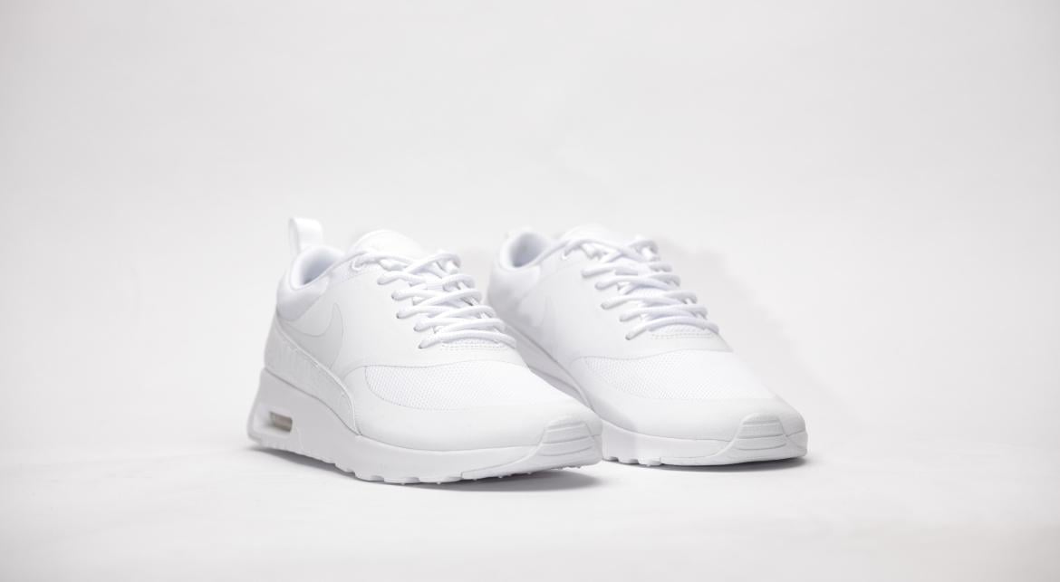 white nike thea
