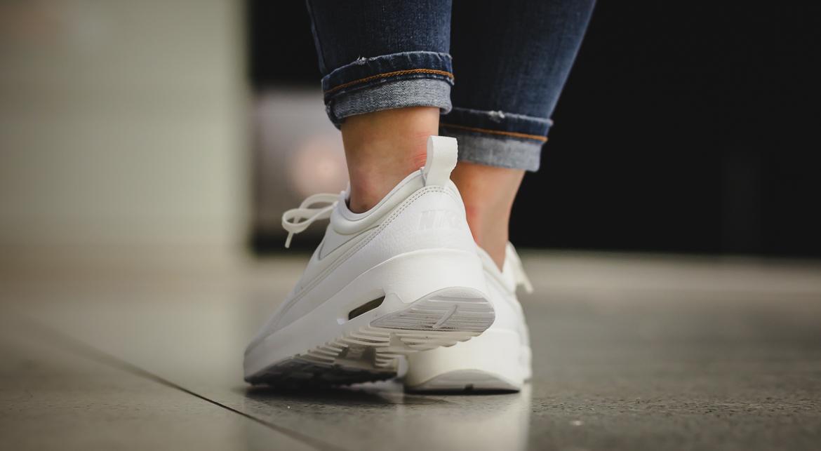white nike thea