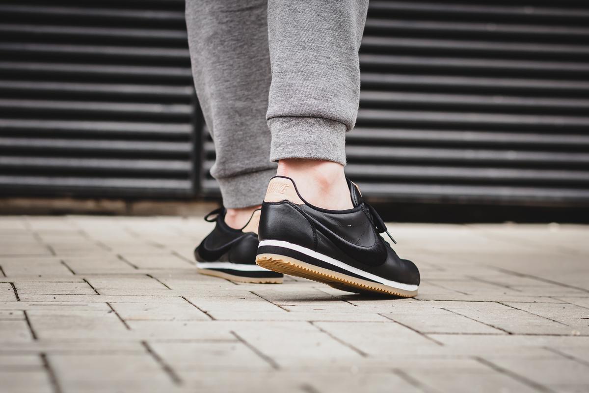 nike cortez black white leather