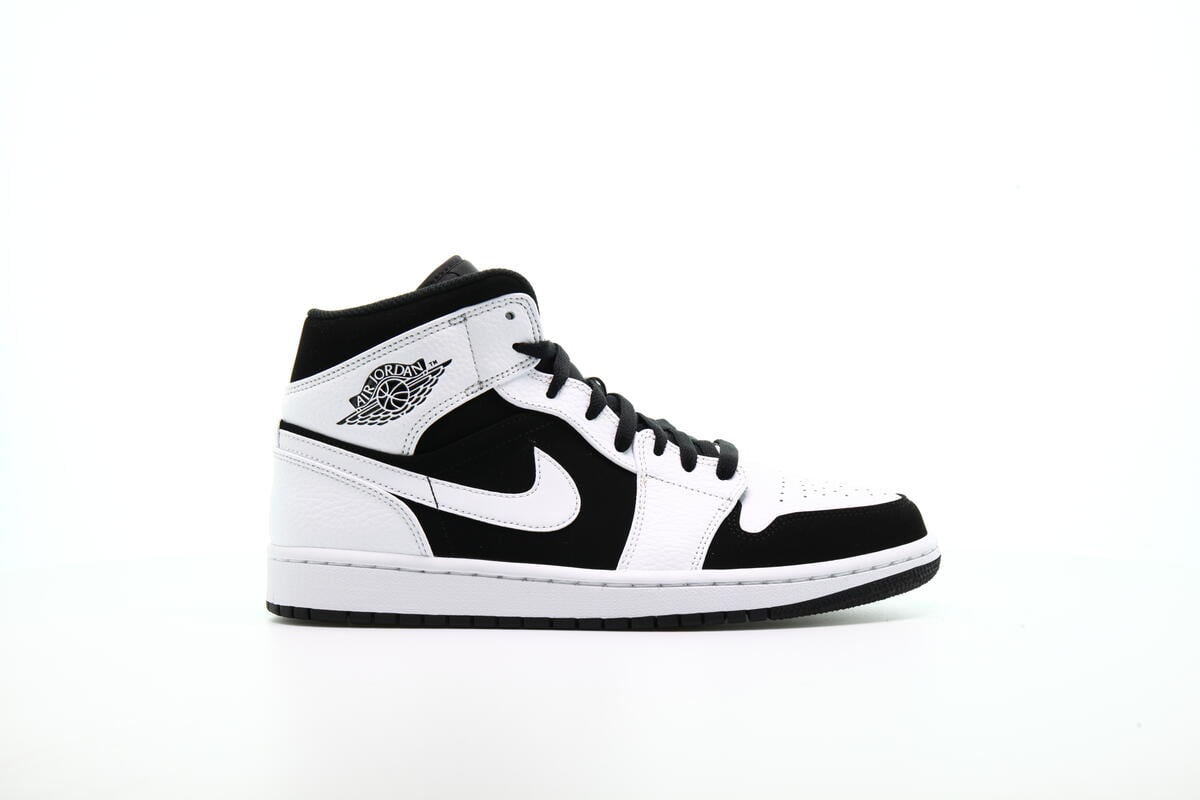 black and white air jordan mid