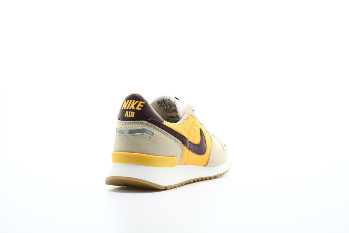 nike yellow air vortex trainers