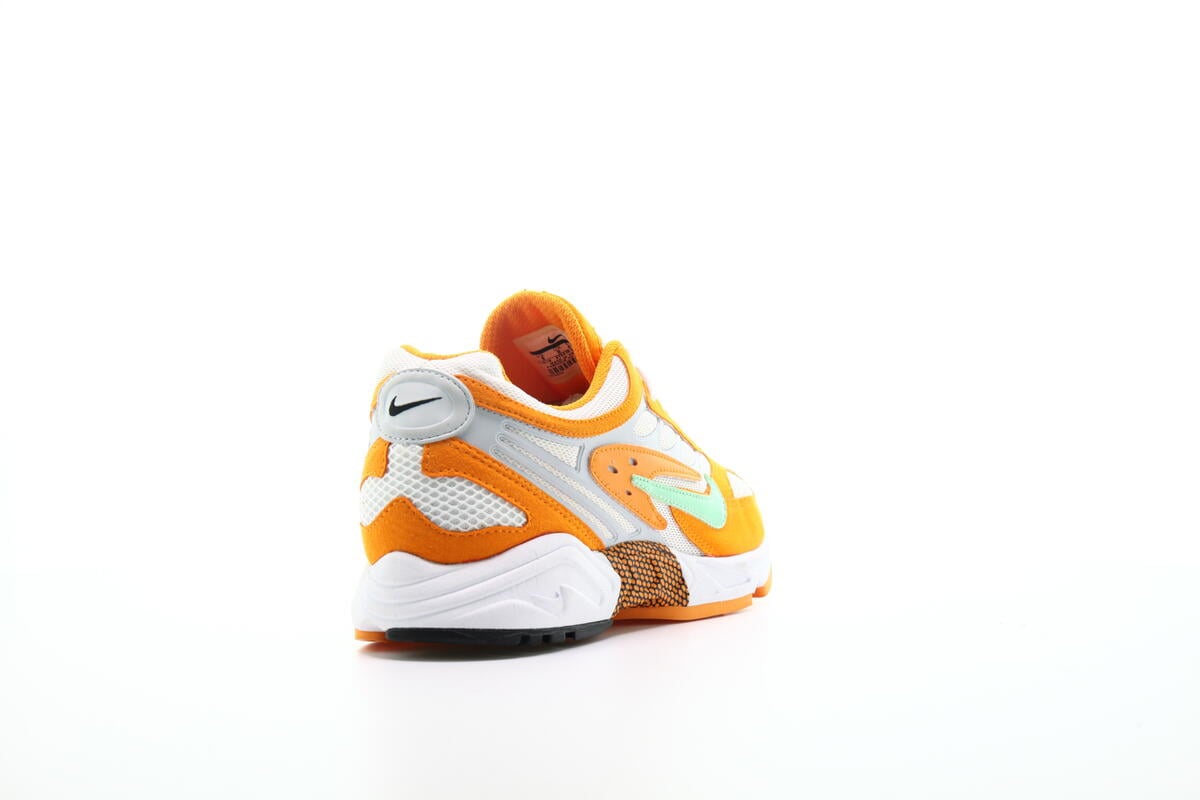 nike air ghost racer in orange peel