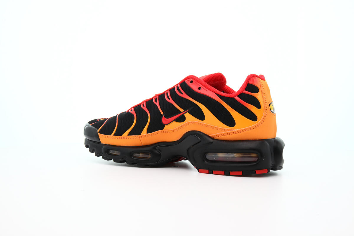 orange and red air max plus