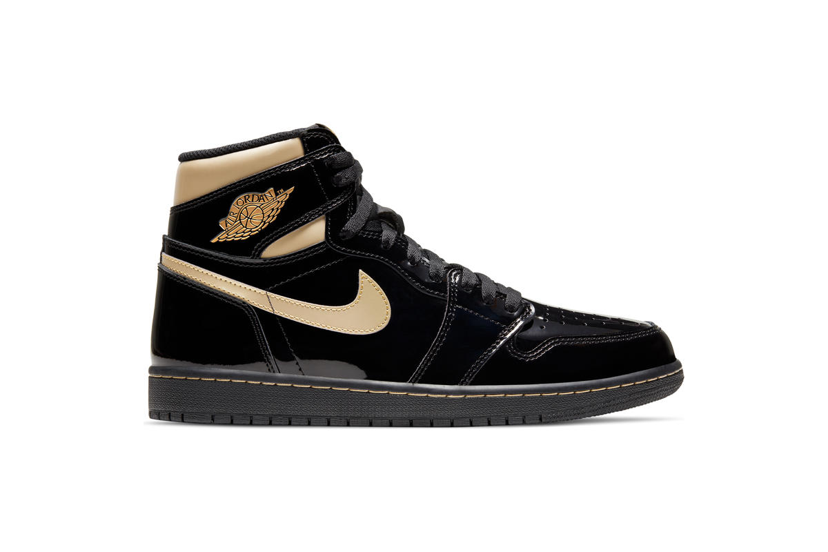 jordan gold and black shoes