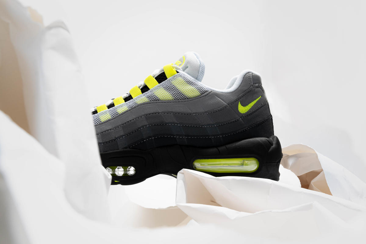 black and neon yellow nike shoes