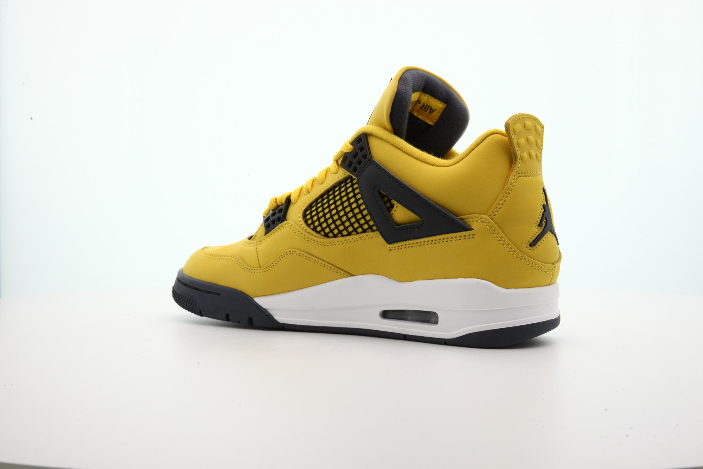 Air Jordan 4 RETRO "Tour Yellow"