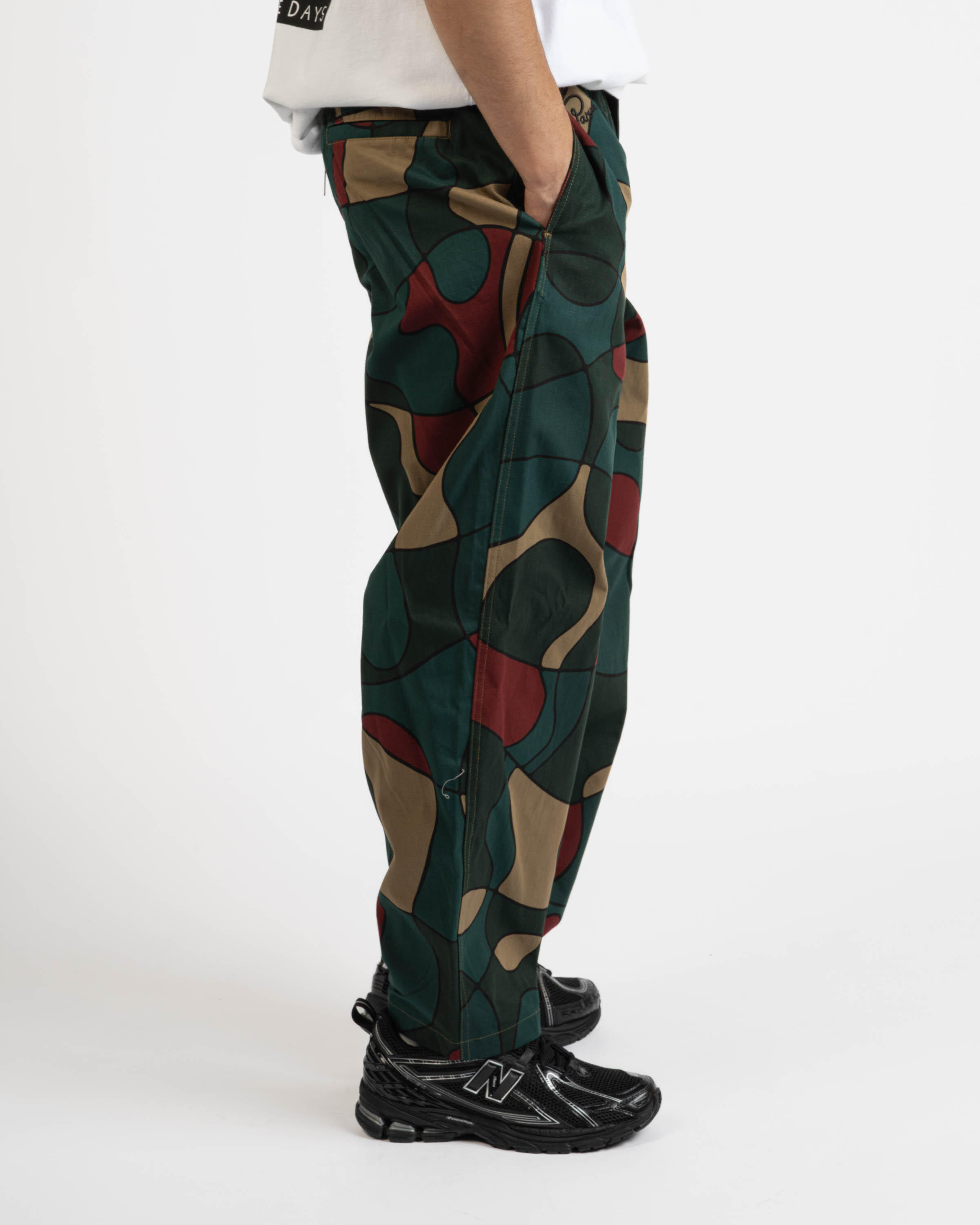 by Parra trees in wind relaxed pants