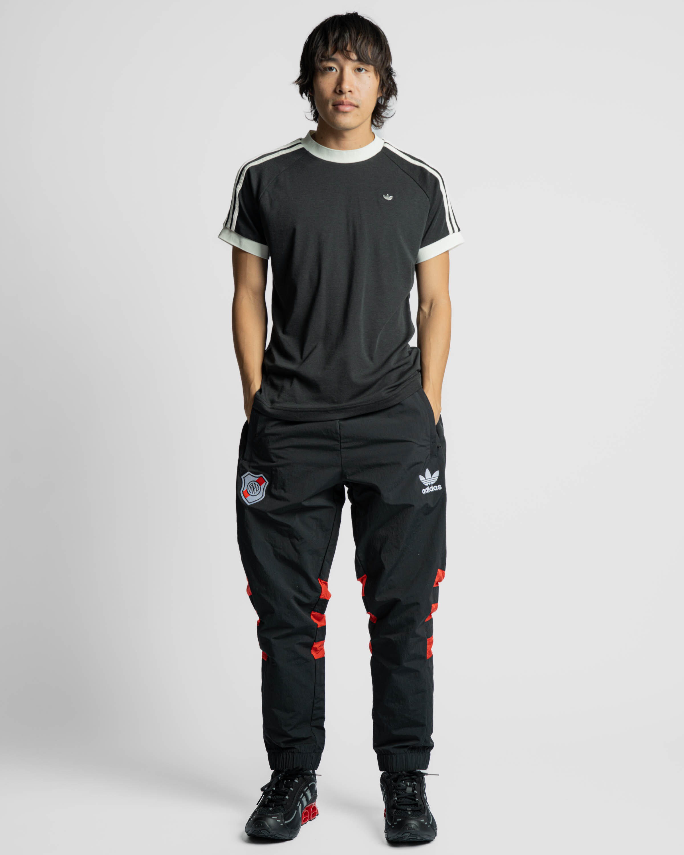 adidas originals ryv taping track pants in black