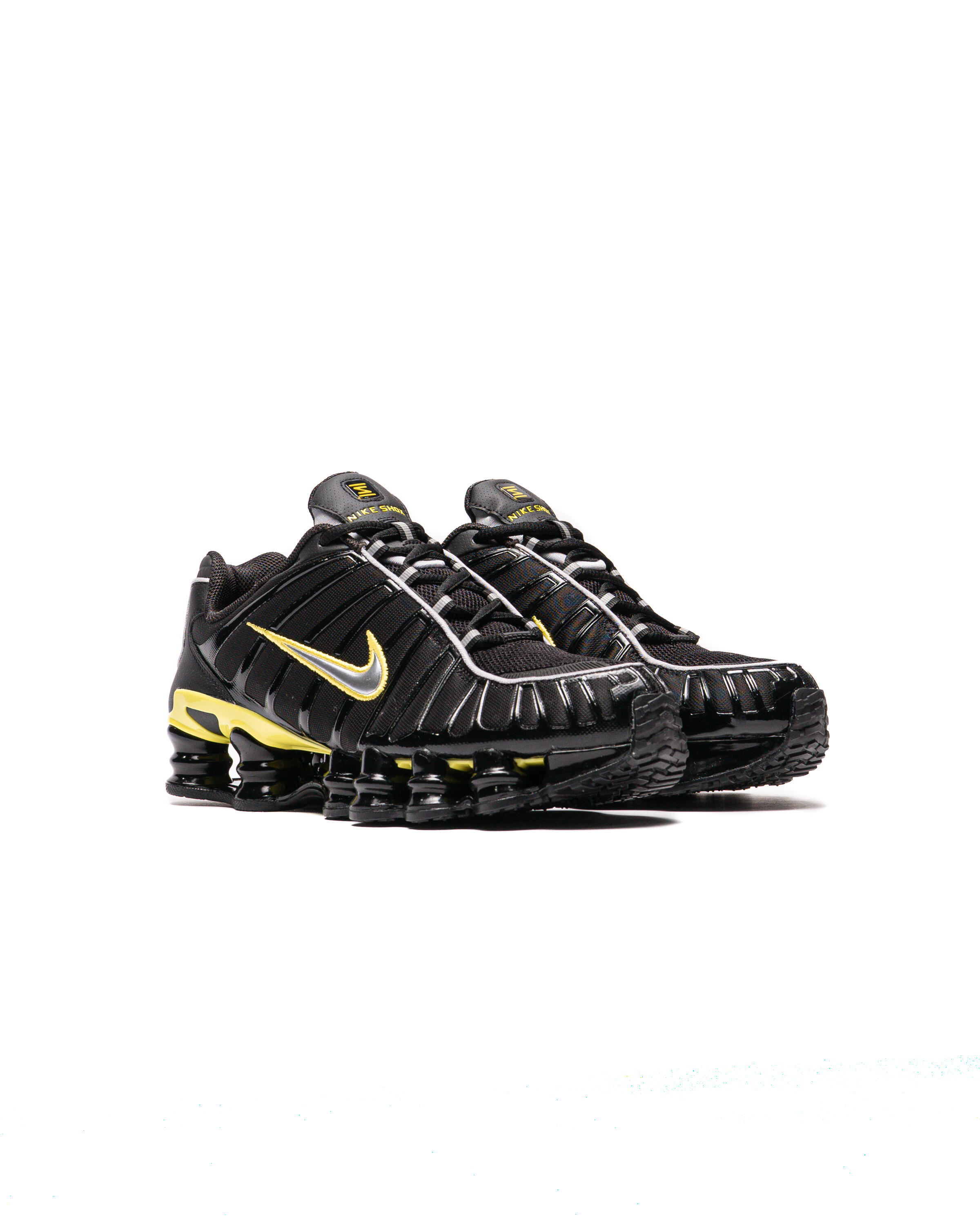 nike shox tl black gold